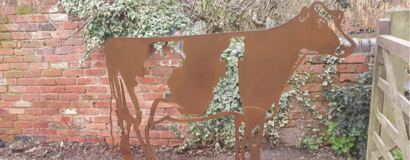Life size cow sculpture